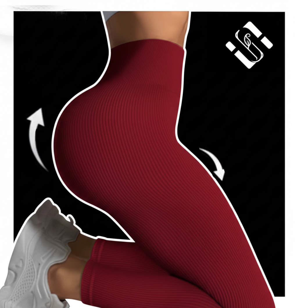 Maroon leggings worn by a person with white sneakers on a black background